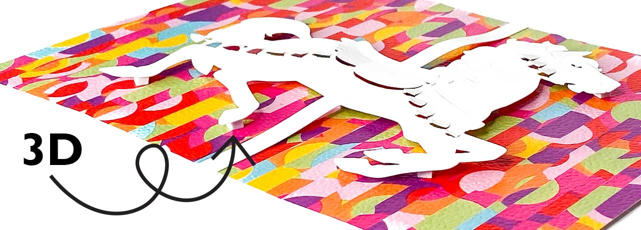 Angled photo of papercut showing 3D qualities.