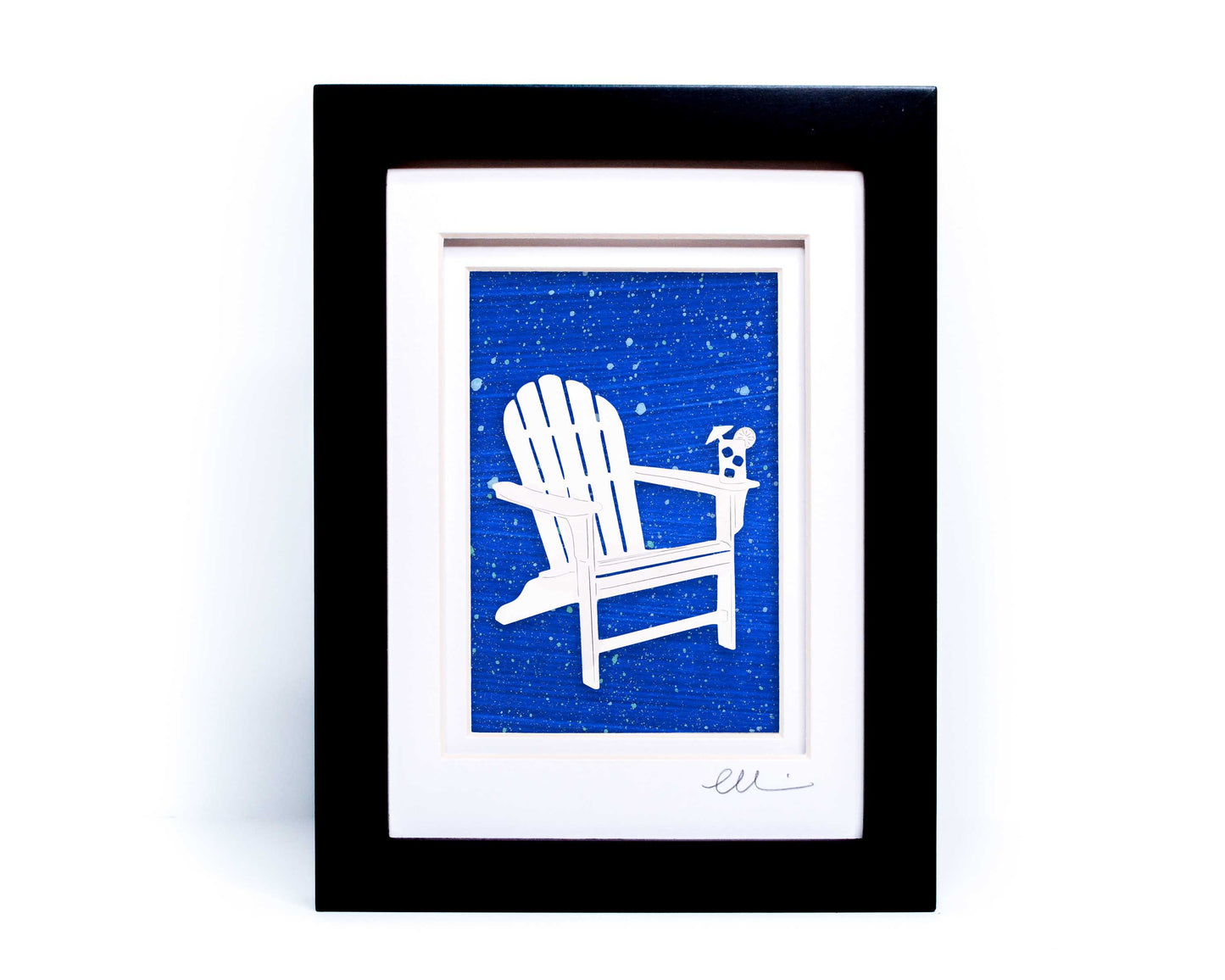 White beach adirondack chair with drink on chair arm papercut on hand painted bright blue splattered background. 