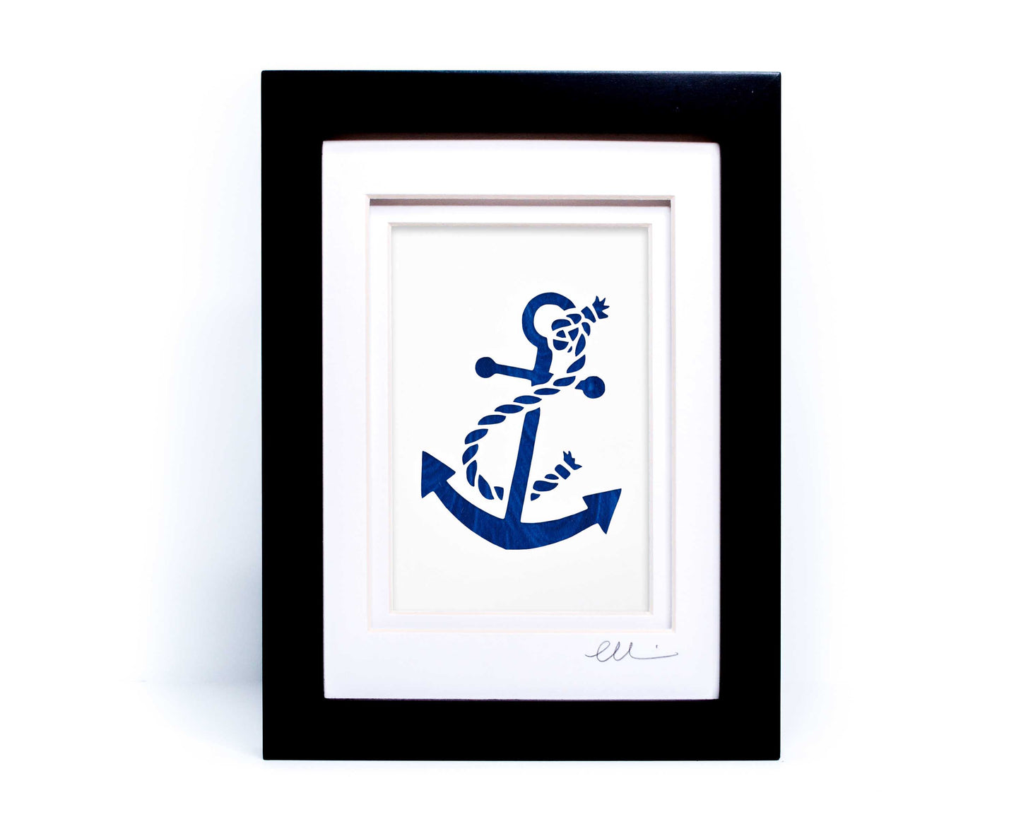 White nautical anchor twisted with rope papercut on hand painted blue wave background.