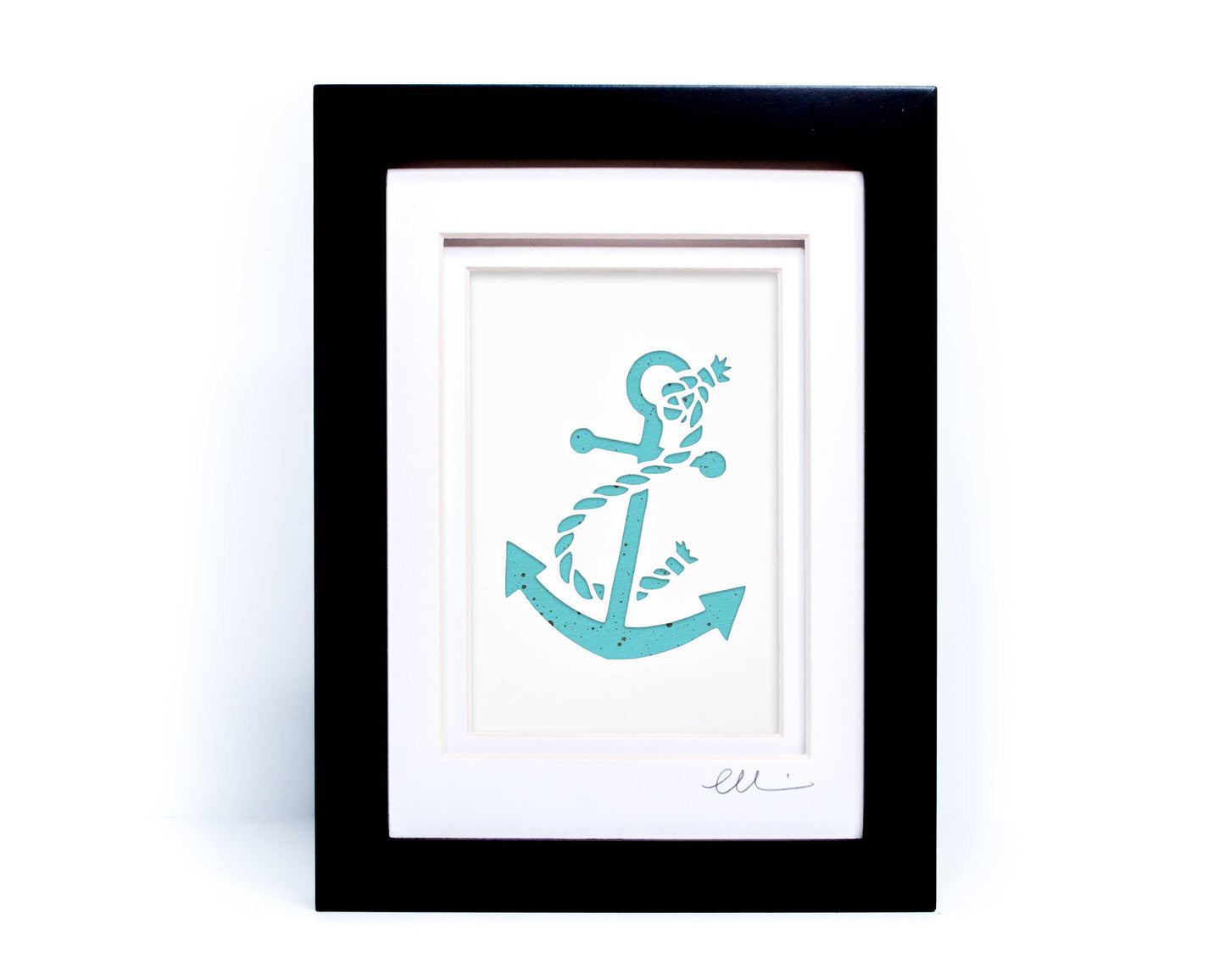 White nautical anchor twisted with rope papercut on hand painted teal background.